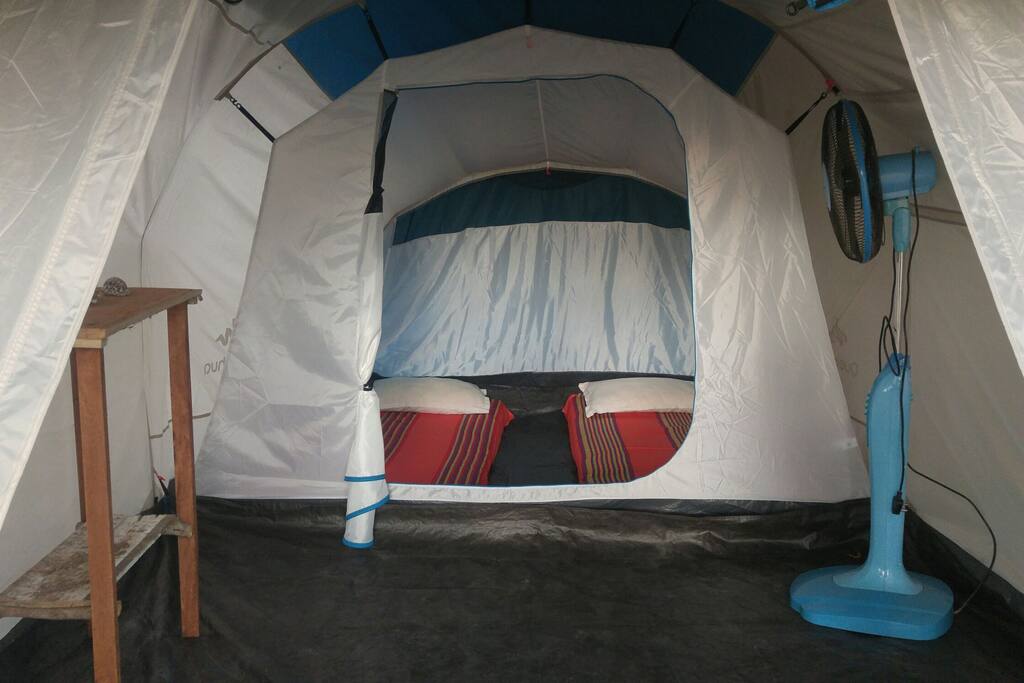 Very clean and spacious inside. With fan, light and power.
