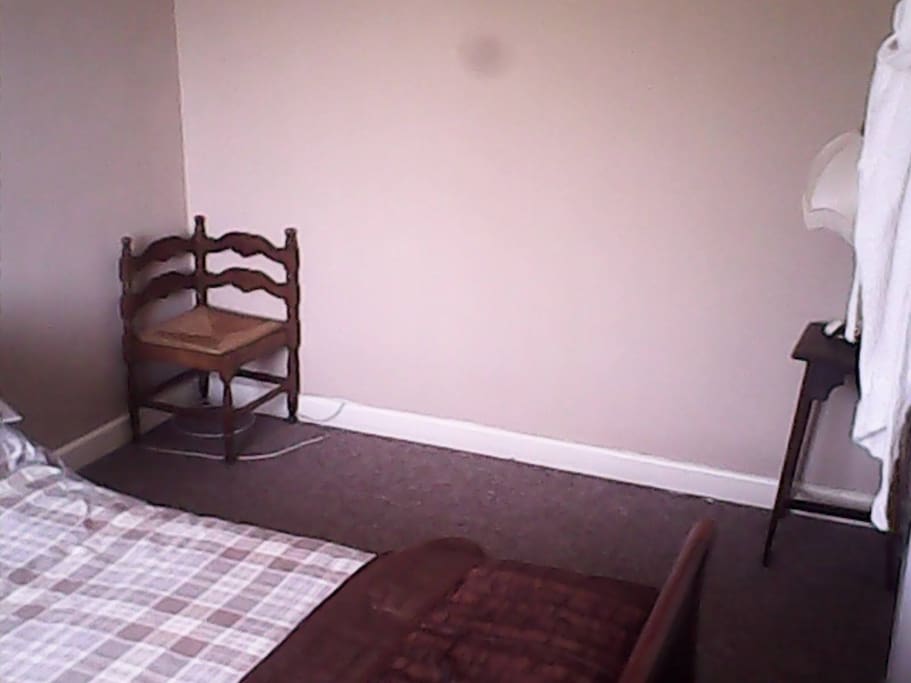 Basic seating is available within the room however a living room is situated downstairs.
