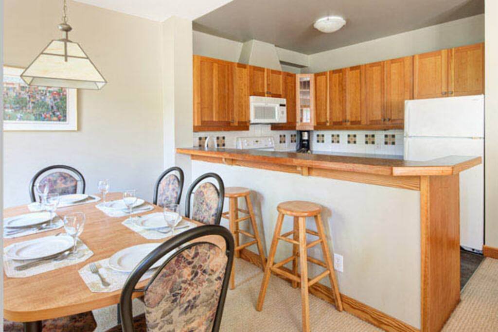 The kitchen and dining area are convenient and spacious