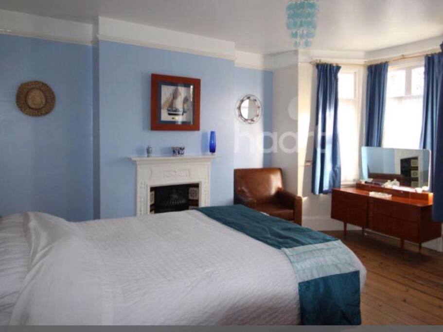 Main bedroom - decor remains the same. King size bed
