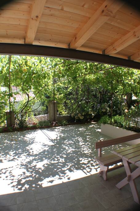 With a nice shaded big table to enjoy Your reading/eating