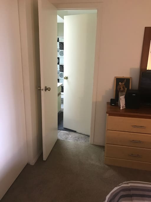 Entry from bedroom to private bathroom