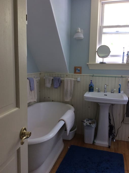 Bathroom has tub and shower