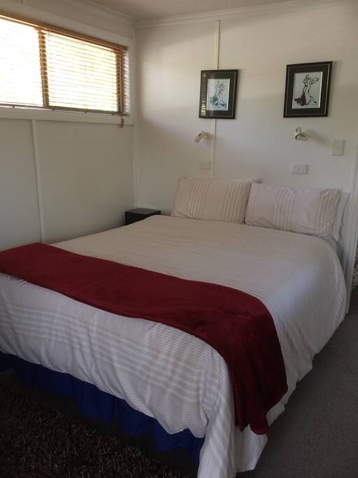 Queen bed in main bedroom