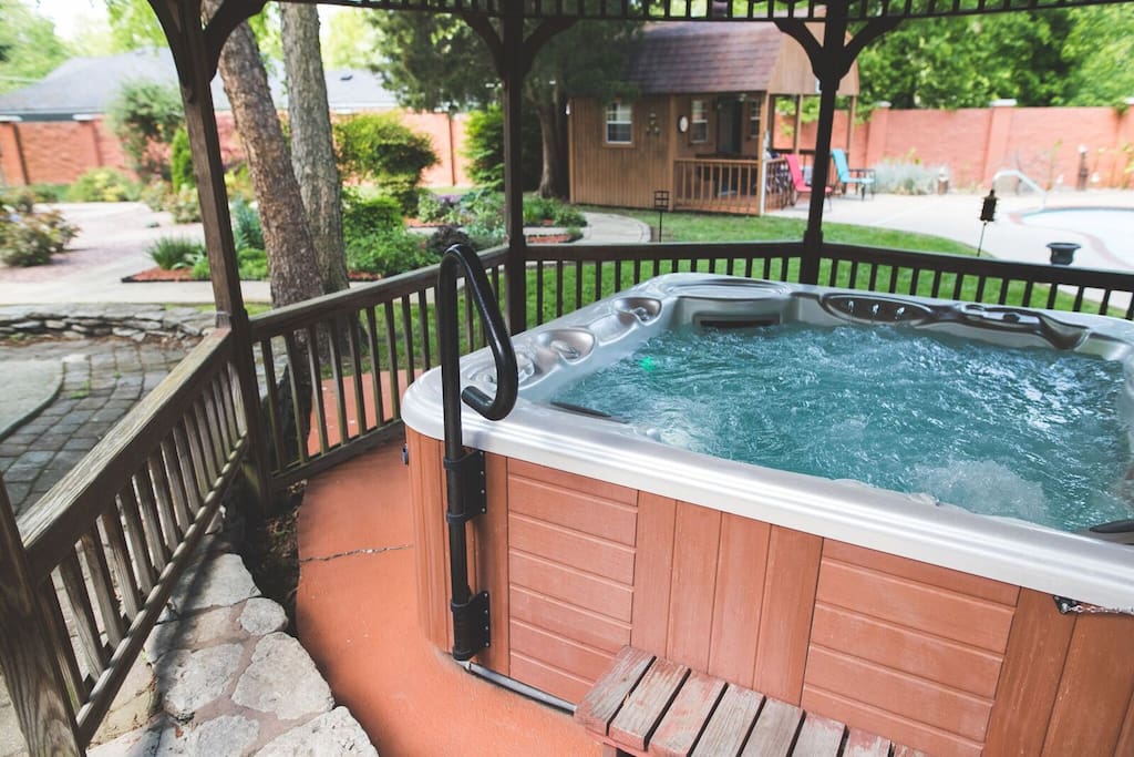 Hot tub under gazebo.