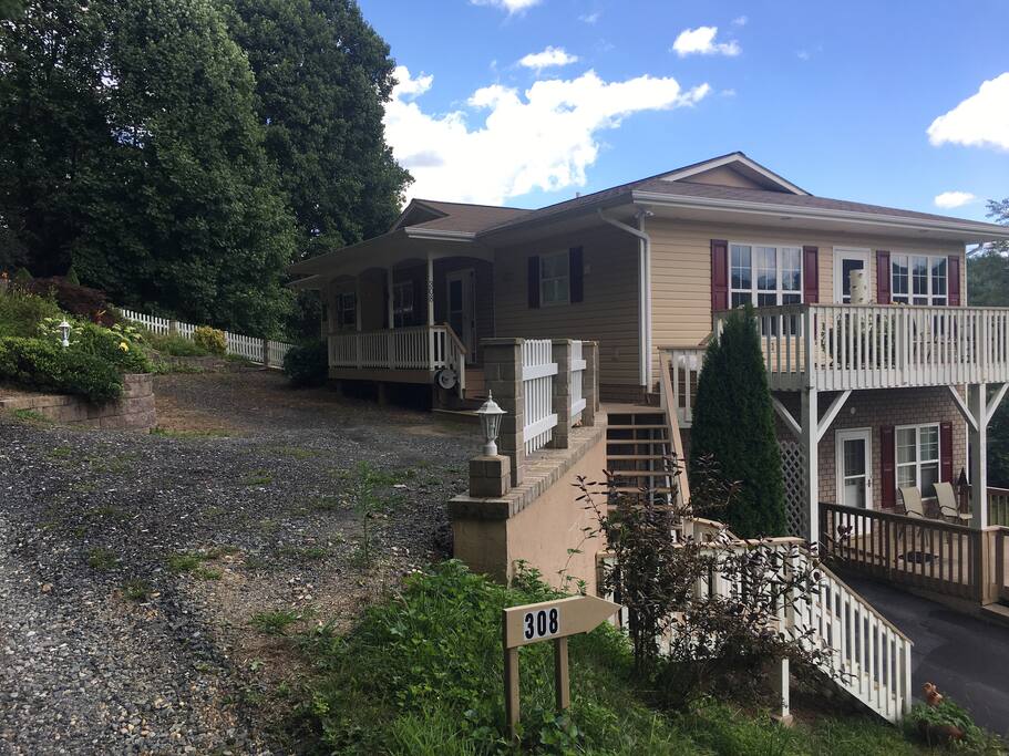 The “upper” driveway, further up the gravel road, allows you to park right outside your guest room.