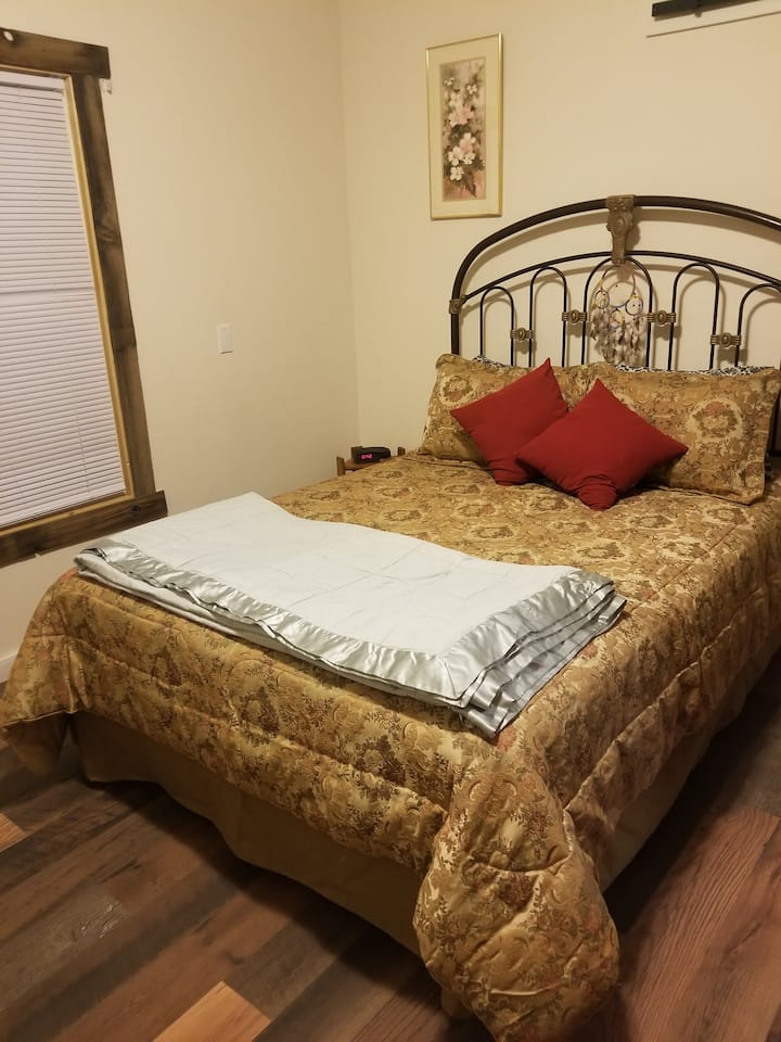 Queen bed in downstairs master 