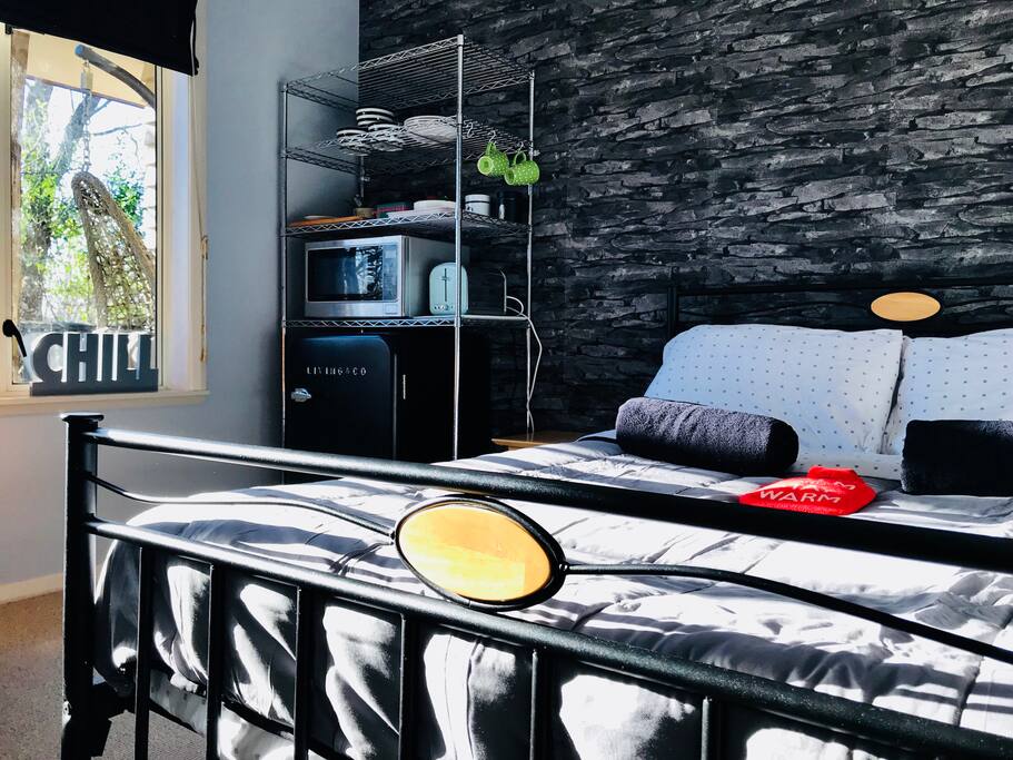 Cozy Bedroom with Kitchenette