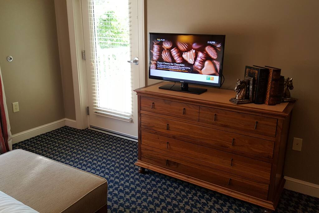 Master bedroom. Plenty of dresser storage and tv