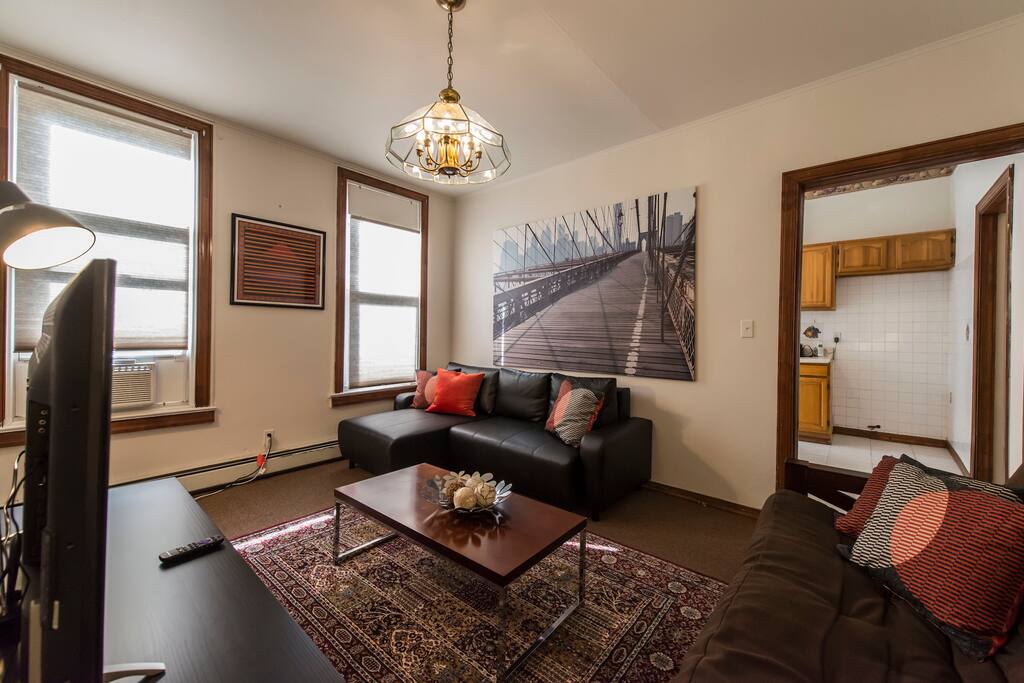 Living Room With 50" Smart TV, 2 Sleeper Sofa