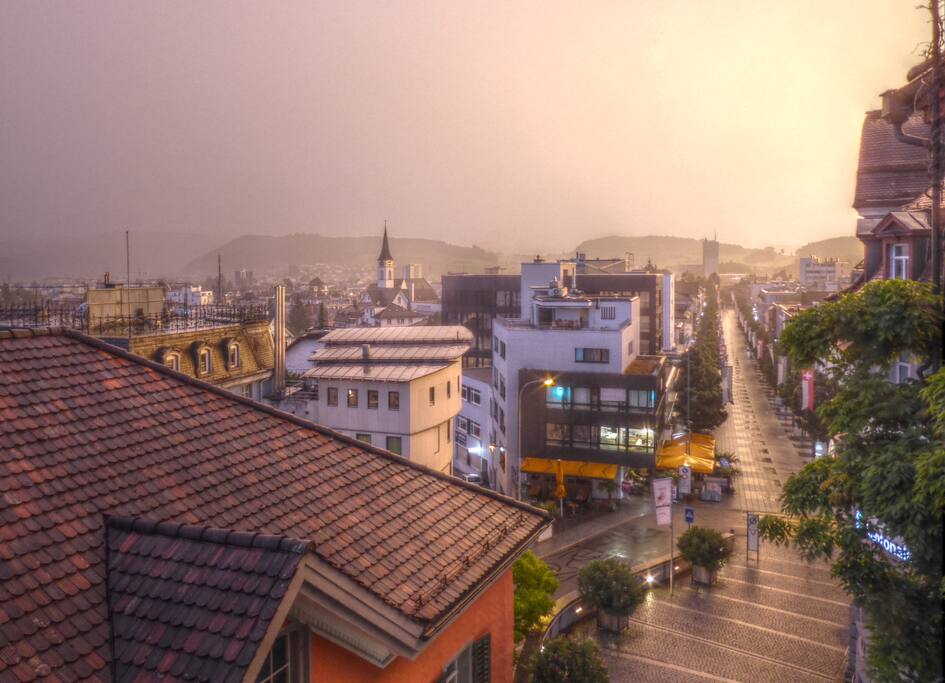 Rain and evening sun, view from the balcony.