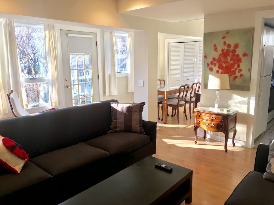 Living room opening onto private patio in rear