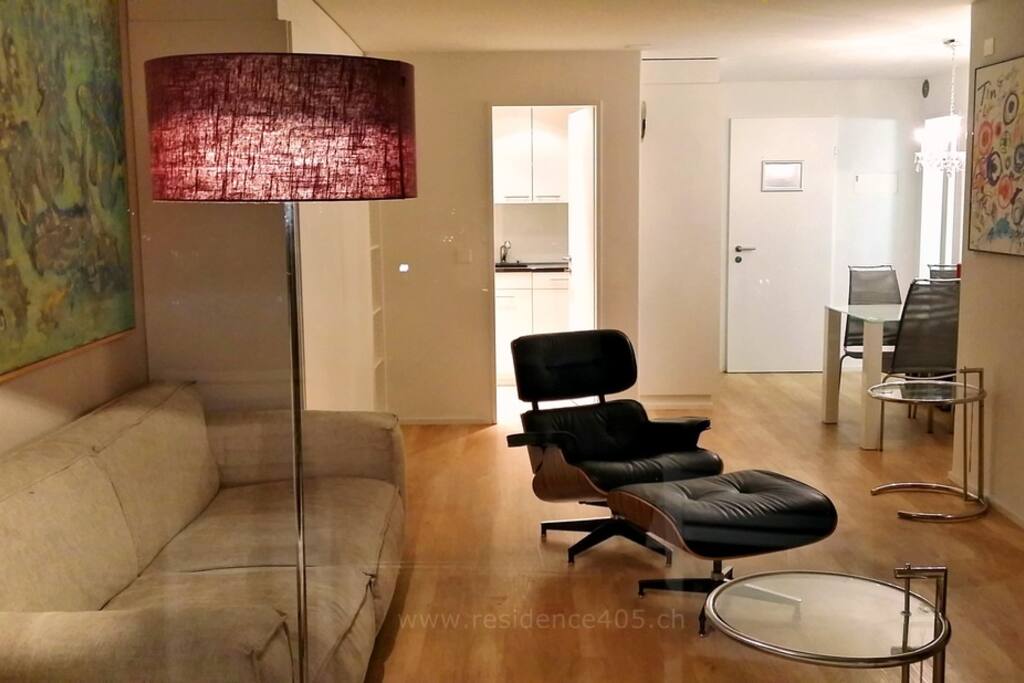 living room, view towards kitchen and dining corner