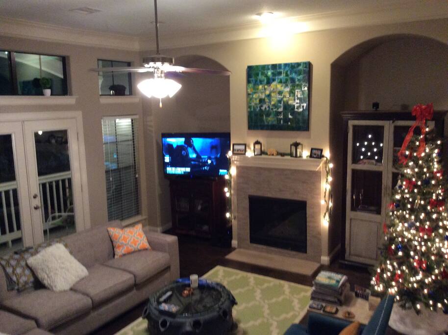 Main living area with balcony access and seating.