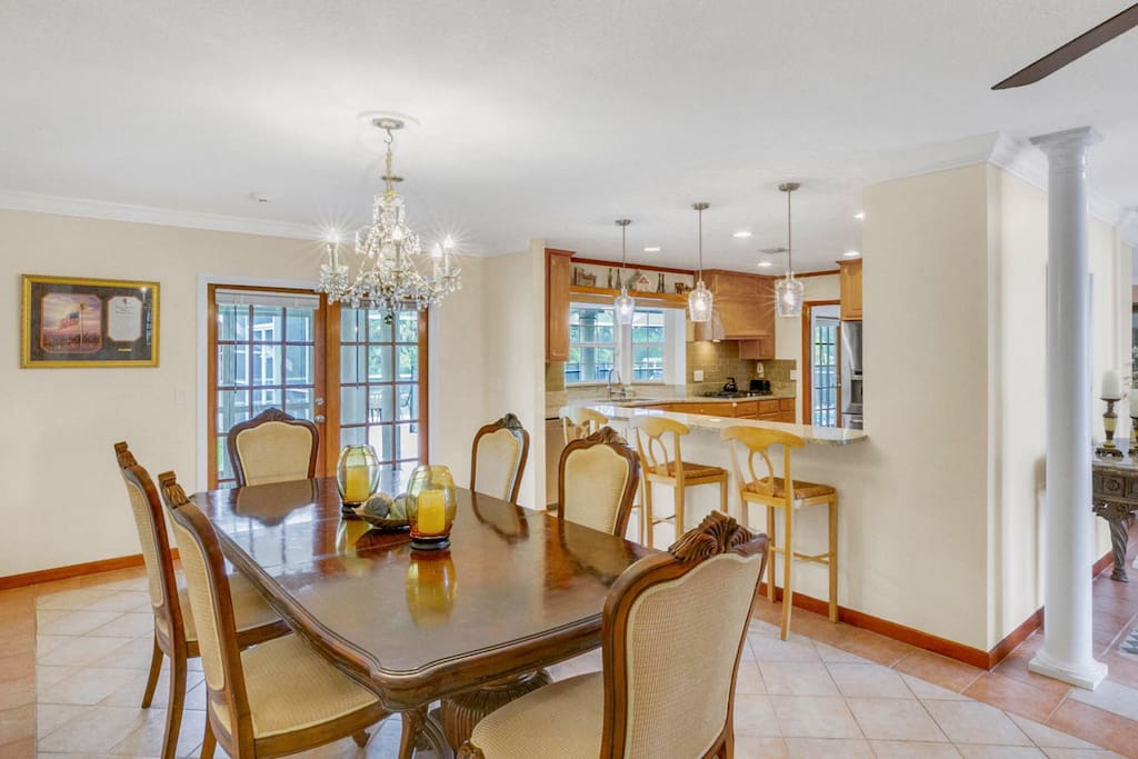 Inviting dining table for six - easy access to the patio nearby.