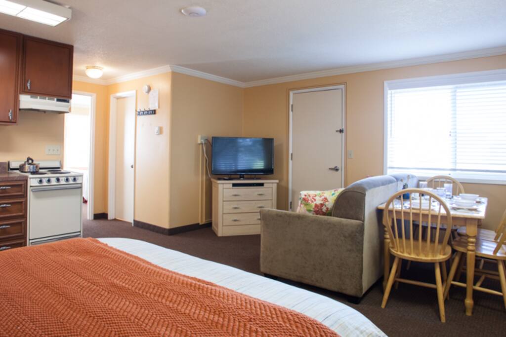 Queen bed in living area