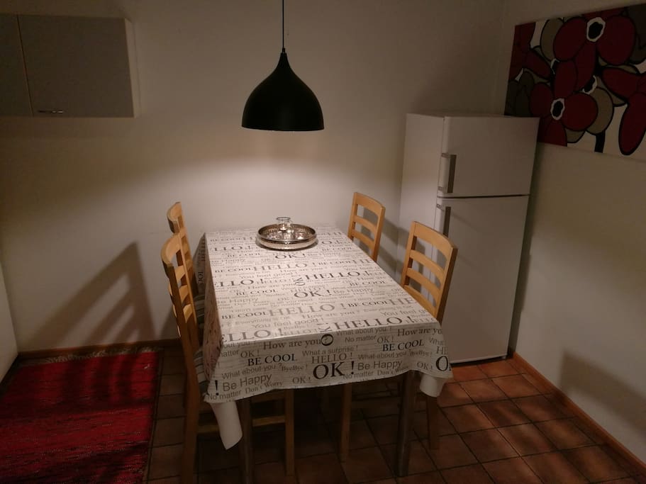 The dining area. There's an extra freeze and fridge in the apartment, should you stay longer.