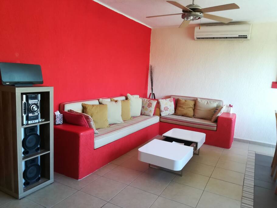 Living room with A/C and fan