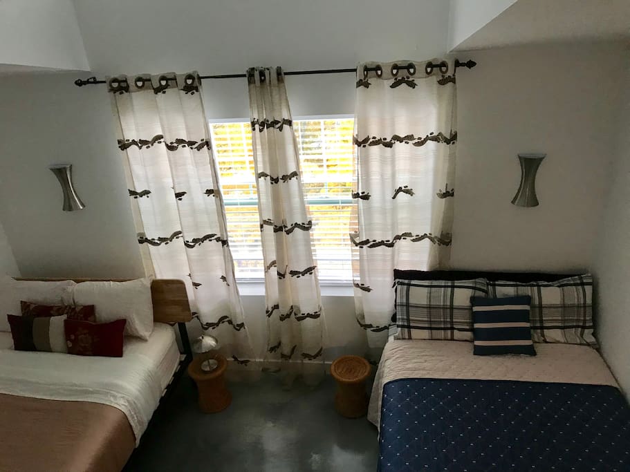 Bedroom setup with two full beds