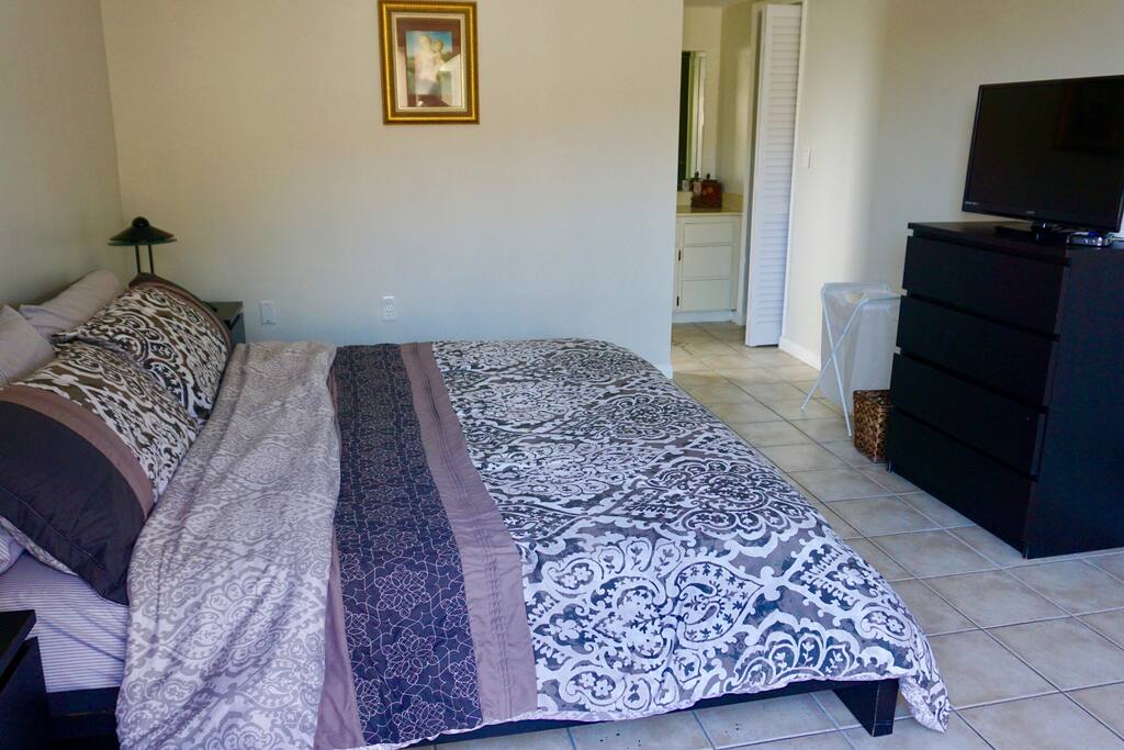 Master Bedroom King bed with TV