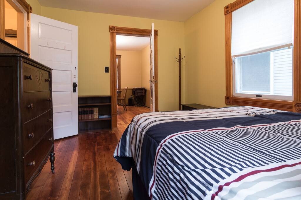 First floor room located off dining room.
