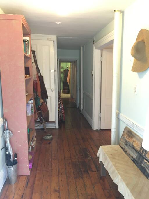 Hallway entrance to the house, and to the right is the private entrance to the guest room.