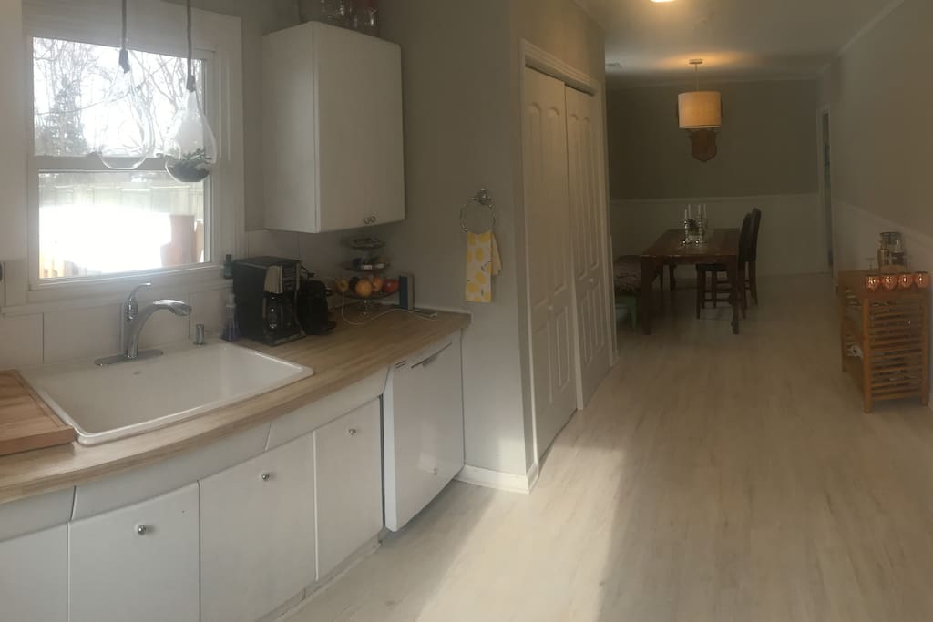 Open, clean kitchen with all you need for a home cooked meal.