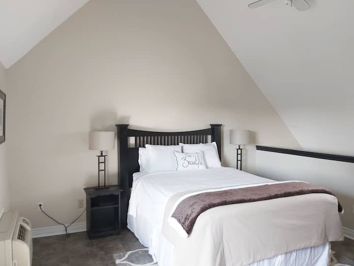 Private loft retreat bedroom with new hotel style mattress and hotel like bedding