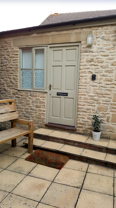 Exterior of the property. Note this is the end of a shared courtyard.