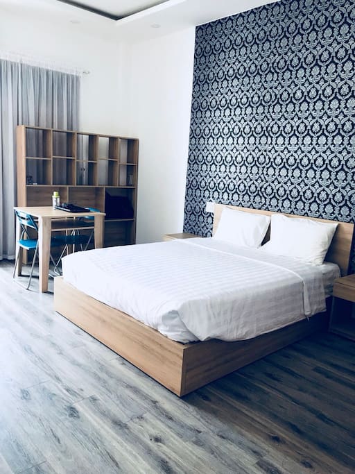 A double bed,bookshelf,,desk and so on(双人床、书架、书桌等)