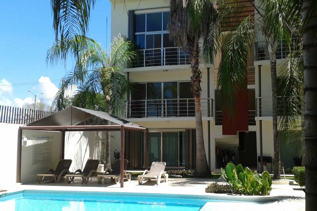 Relax yourself in our lovely tropical garden!