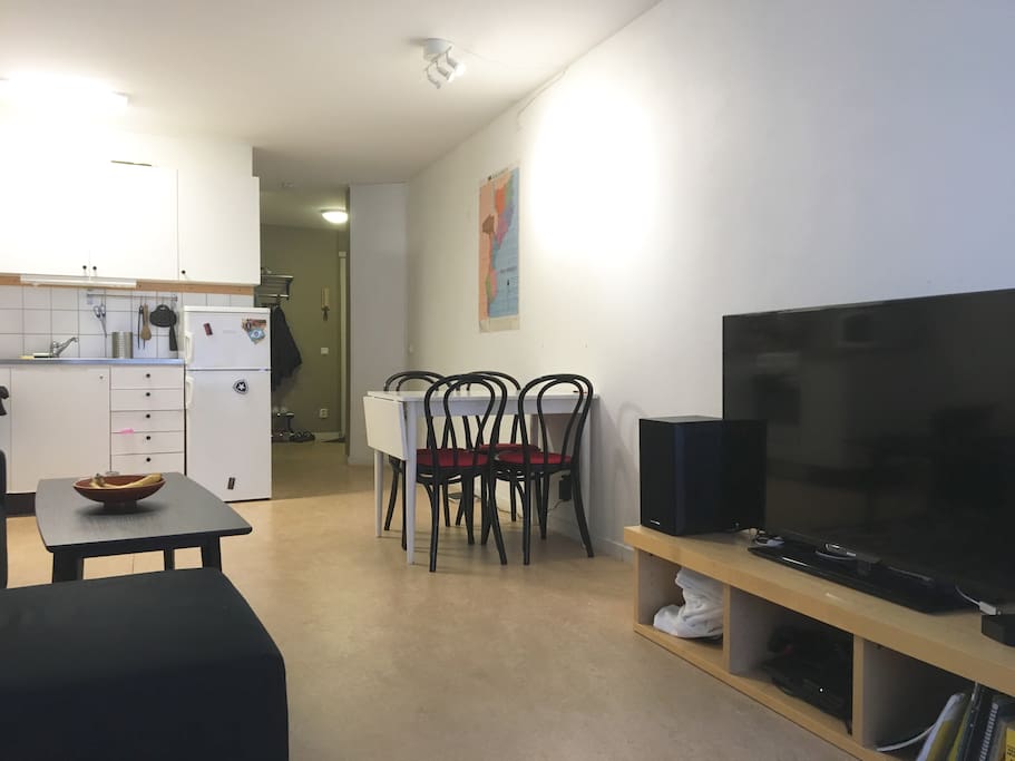 TV and small kitchen table.