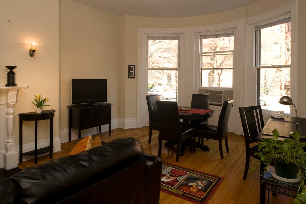 Dining area at bow front windows