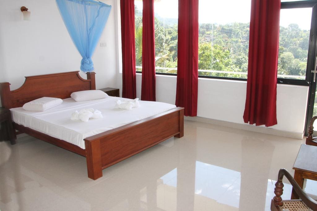 Delux double room with the private balcony to the view .