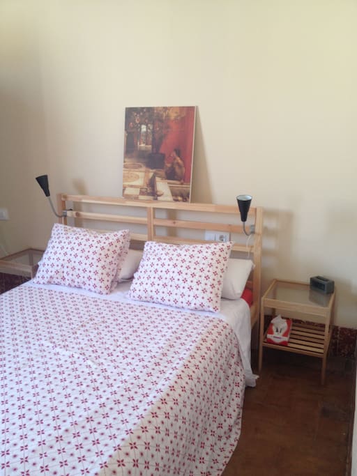 Bright, sunny room with a new double bed and A/C