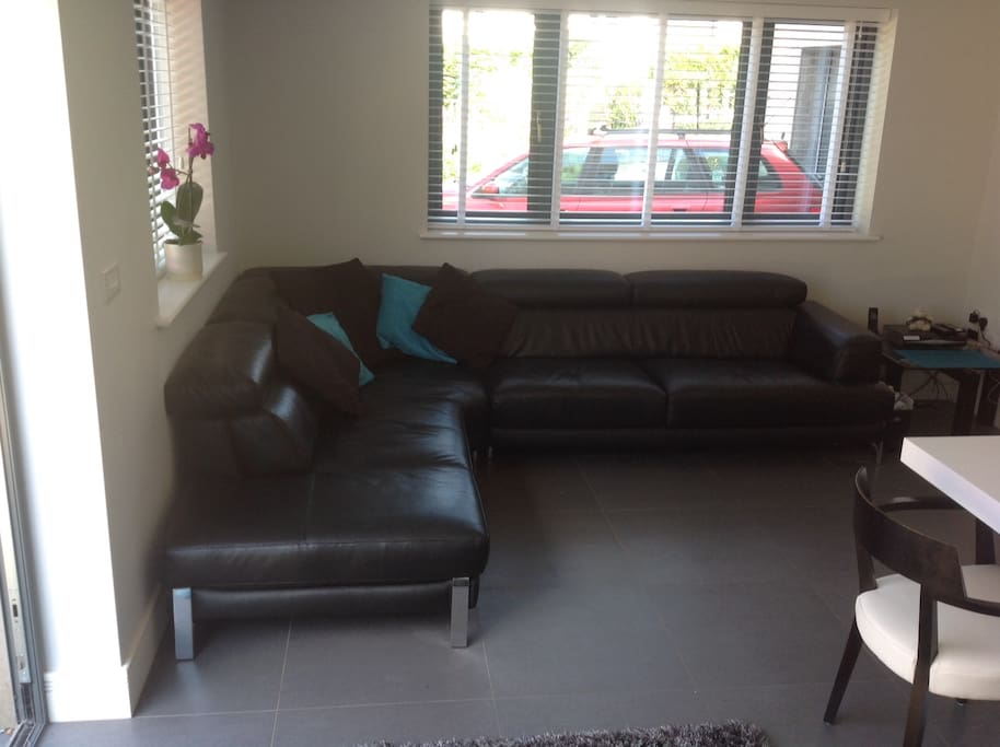 Kitchen; L shaped sofa.