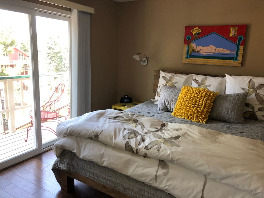 Master bedroom with a king sized heavenly brand bed - seriously
