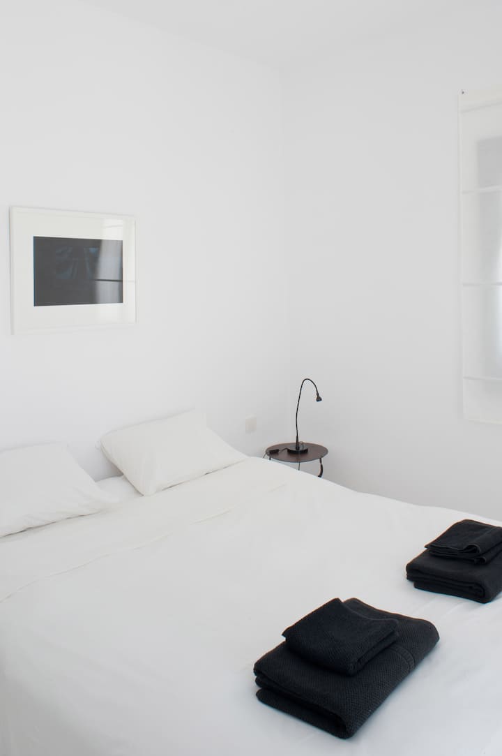 The bedroom with the double bed/ The bedroom with the double bed