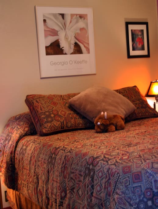 This queen bed is so comfy you may never want to leave!