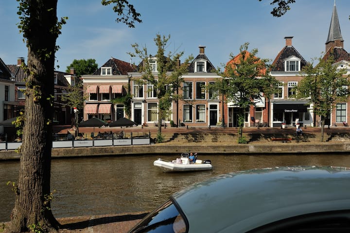 Canal building in the middle of the historic center Dokkum