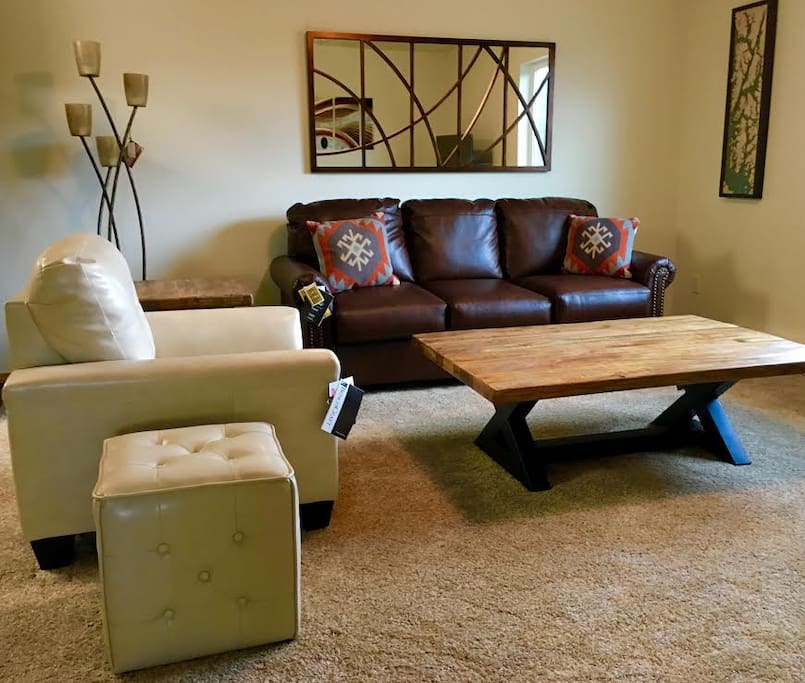 Living room with leather furniture.