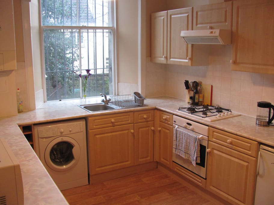 Spacious kitchen with all amenities and dining space for 4