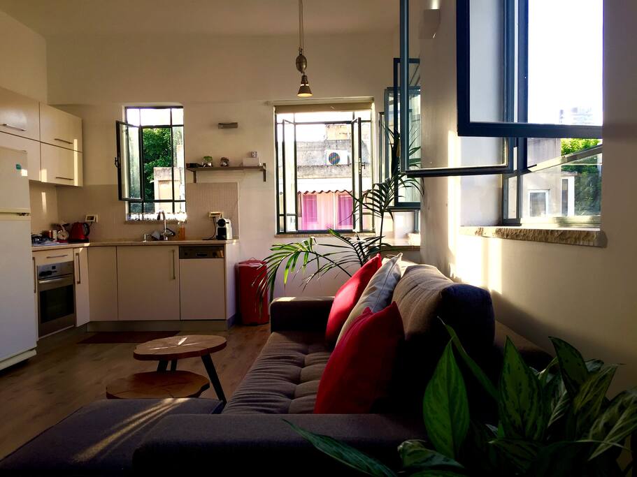 Bright, sunny and spacious living room and kitchen.