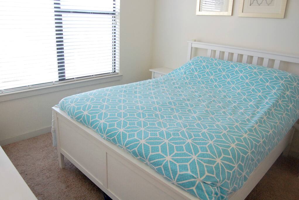 Very comfortable queen sized bed in the bedroom. Lots of great natural light, but easily blocked out with the venetian blinds.