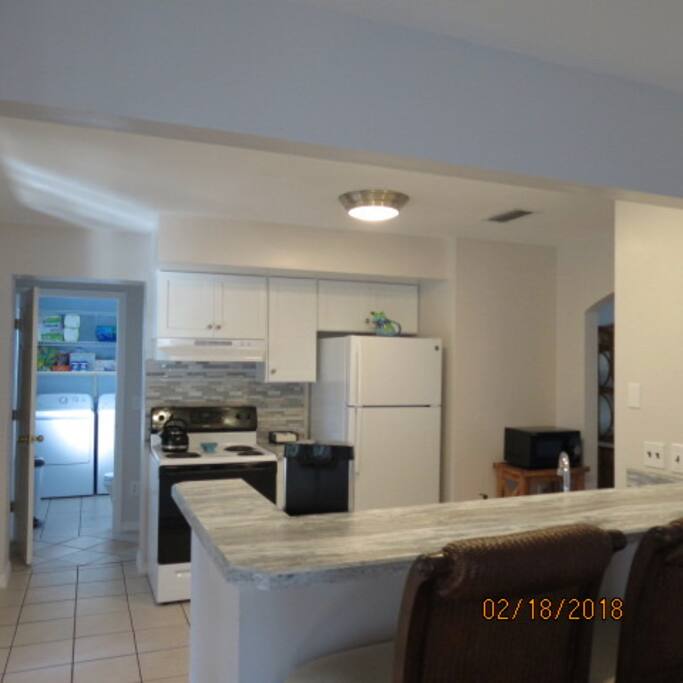 Kitchen, 1/2 bath, laundry room