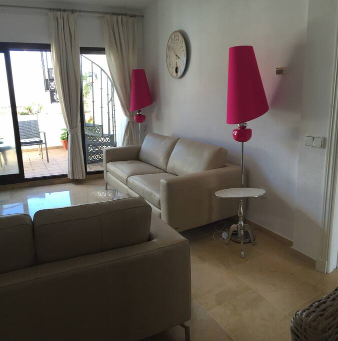 Sitting Room leading out to smaller lower terrace