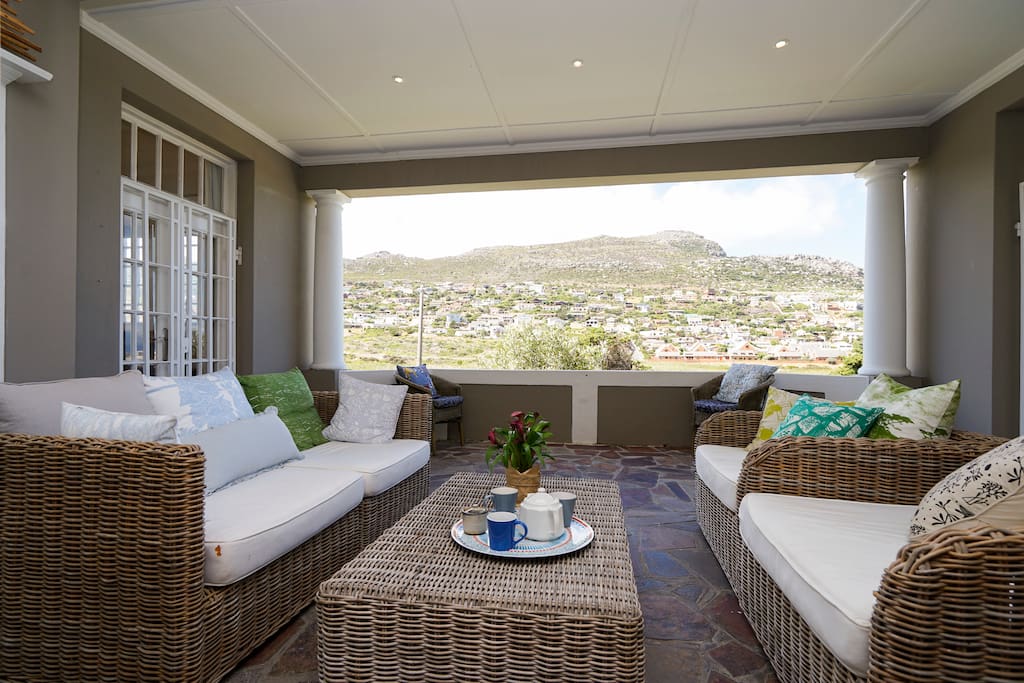Covered veranda sheltered from the wind and view of the wetland and sea