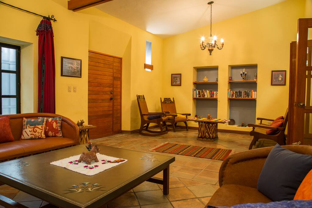 Built-in bookcases stocked with books so you can enjoy a relaxing day in the back garden.