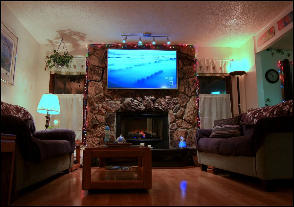 Comfortable couches and great living room setting with beautiful fire place