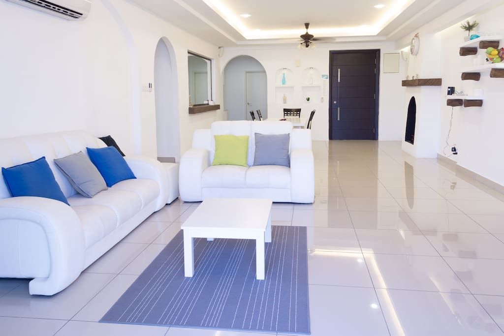 The living room is spacious and bright